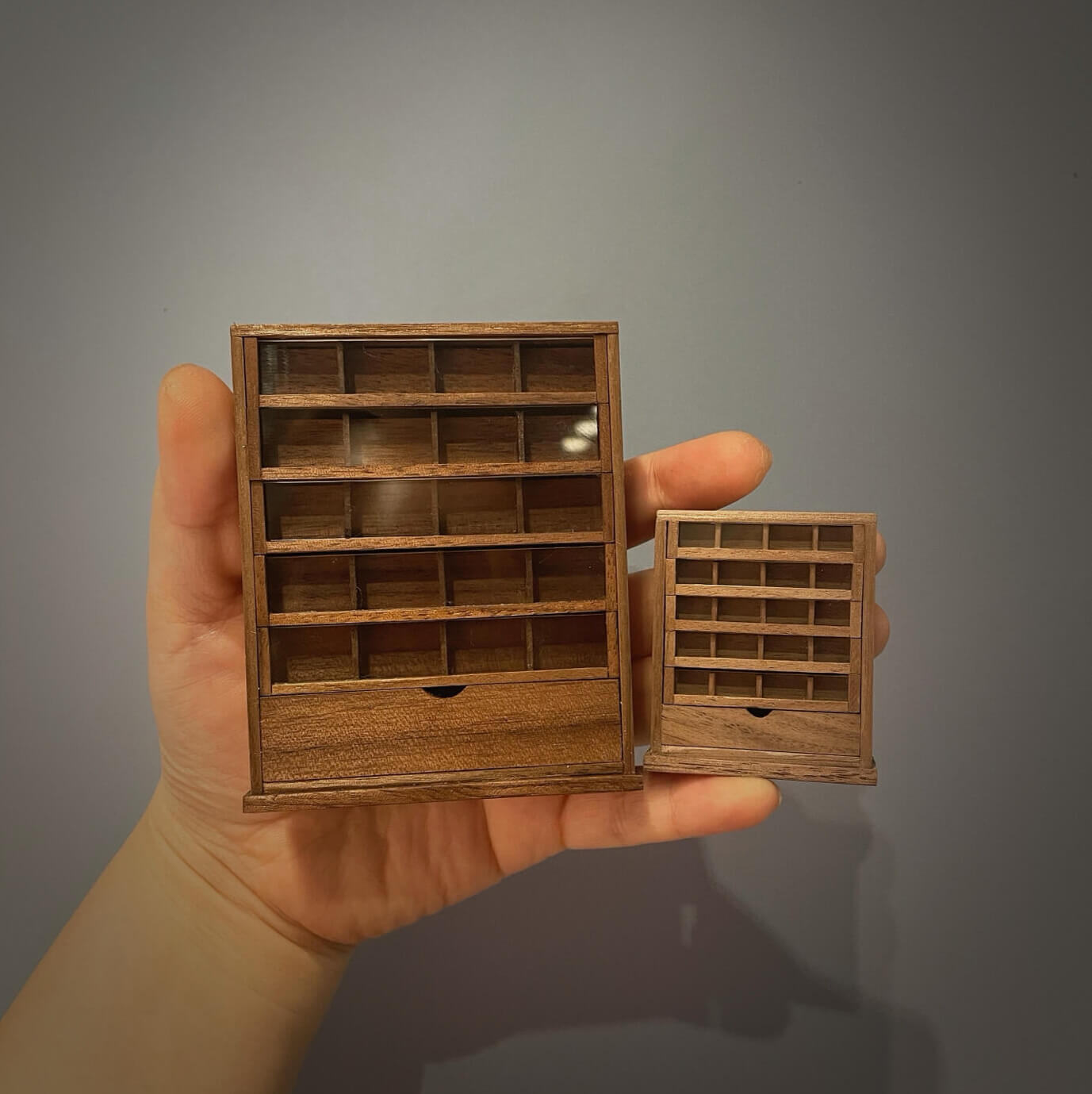 Spool cabinets are charming and functional pieces of antique furniture that were once used to store sewing thread spools. Default Color/ Finish: Cherry wood or Dark walnut Material: Black Walnut wood or Cherry wood Scale: 1/12 (4.1×1.7×5cm / 1.61×0.67×1.97in); 1/6 (7×2.7×8.2cm / 2.76×1.06×3.23in).