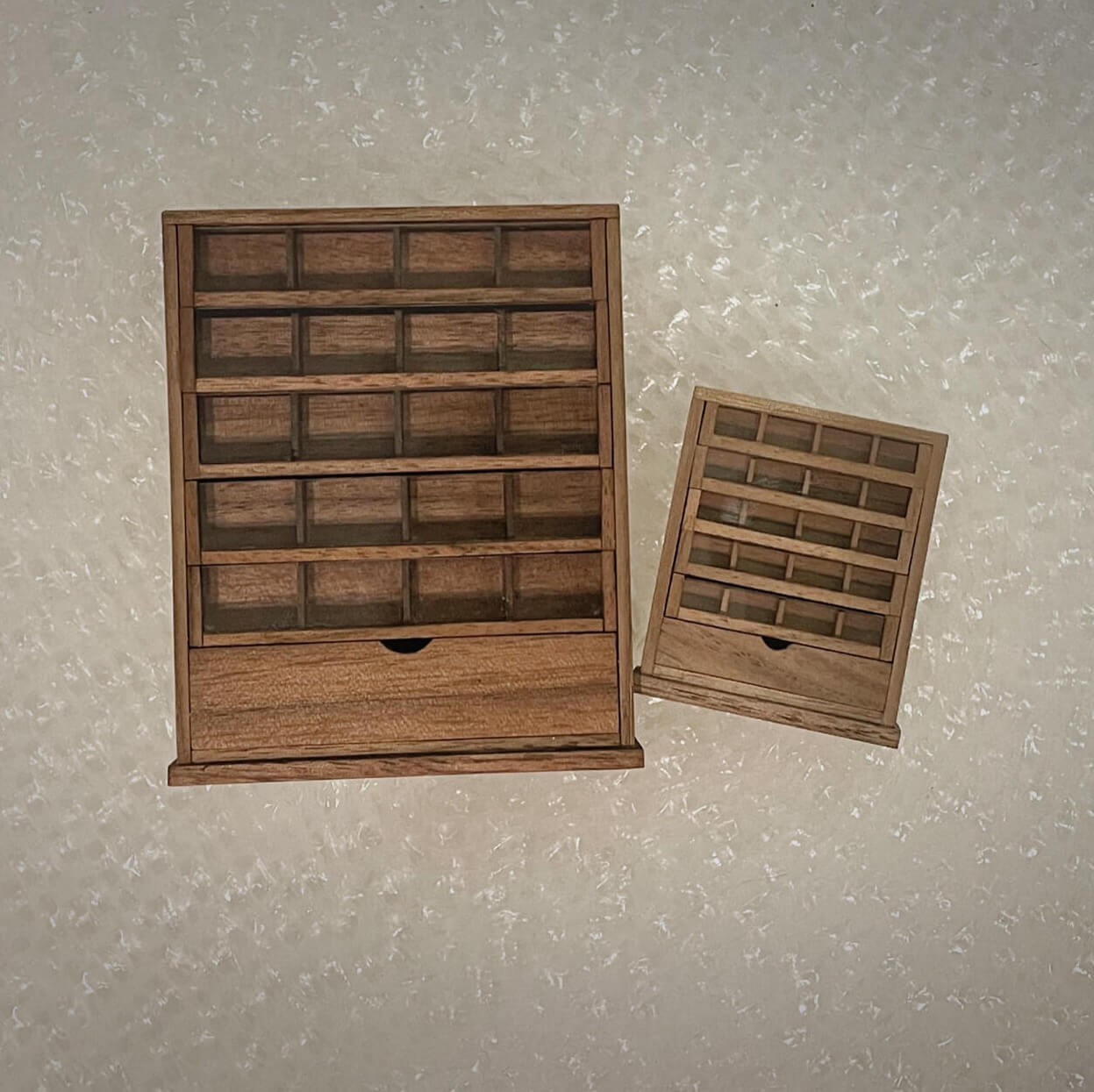 Spool cabinets are charming and functional pieces of antique furniture that were once used to store sewing thread spools. Default Color/ Finish: Cherry wood or Dark walnut Material: Black Walnut wood or Cherry wood Scale: 1/12 (4.1×1.7×5cm / 1.61×0.67×1.97in); 1/6 (7×2.7×8.2cm / 2.76×1.06×3.23in).