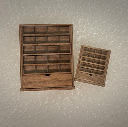 Spool cabinets are charming and functional pieces of antique furniture that were once used to store sewing thread spools. Default Color/ Finish: Cherry wood or Dark walnut Material: Black Walnut wood or Cherry wood Scale: 1/12 (4.1×1.7×5cm / 1.61×0.67×1.97in); 1/6 (7×2.7×8.2cm / 2.76×1.06×3.23in).