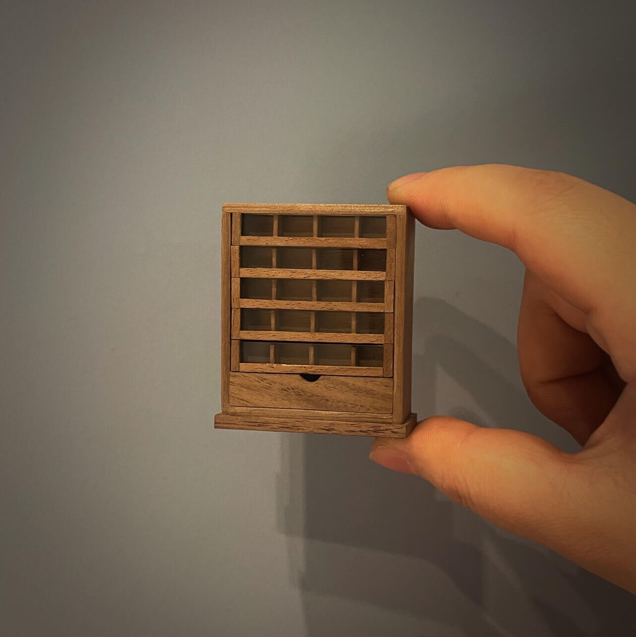 Spool cabinets are charming and functional pieces of antique furniture that were once used to store sewing thread spools. Default Color/ Finish: Cherry wood or Dark walnut Material: Black Walnut wood or Cherry wood Scale: 1/12 (4.1×1.7×5cm / 1.61×0.67×1.97in); 1/6 (7×2.7×8.2cm / 2.76×1.06×3.23in).