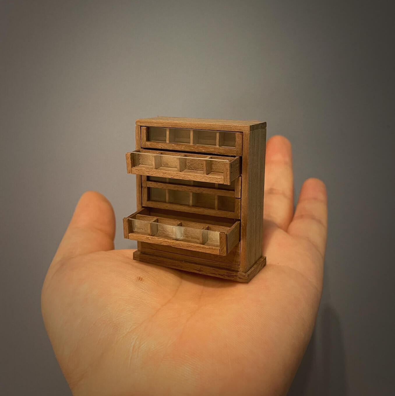 Spool cabinets are charming and functional pieces of antique furniture that were once used to store sewing thread spools. Default Color/ Finish: Cherry wood or Dark walnut Material: Black Walnut wood or Cherry wood Scale: 1/12 (4.1×1.7×5cm / 1.61×0.67×1.97in); 1/6 (7×2.7×8.2cm / 2.76×1.06×3.23in).