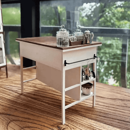 This Miniature Kitchen Island Table will look wonderful inside any room of your dollhouse, perfect for a cottage country look, or just to be exposed in your real house.  Default Color/ Finish: White and Brown Material: Solid Wood Type: Kitchen Island Table Scale: 1/6 (20×12×15.5cm / 7.87×4.72×6.10in)