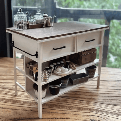 This Miniature Kitchen Island Table will look wonderful inside any room of your dollhouse, perfect for a cottage country look, or just to be exposed in your real house.  Default Color/ Finish: White and Brown Material: Solid Wood Type: Kitchen Island Table Scale: 1/6 (20×12×15.5cm / 7.87×4.72×6.10in)