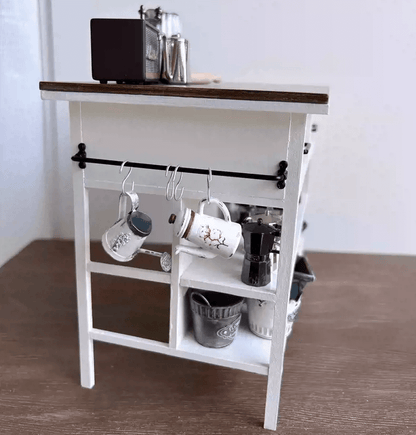 This Miniature Kitchen Island Table will look wonderful inside any room of your dollhouse, perfect for a cottage country look, or just to be exposed in your real house.  Default Color/ Finish: White and Brown Material: Solid Wood Type: Kitchen Island Table Scale: 1/6 (20×12×15.5cm / 7.87×4.72×6.10in)