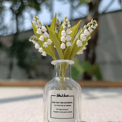 Lily of the valley (Convallaria majalis) is a shade-loving perennial with bell-shaped flowers that makes a good ground cover.  Scale: 1:6; 1:12  Material: Handmade from Clay  Size: 1 Stem