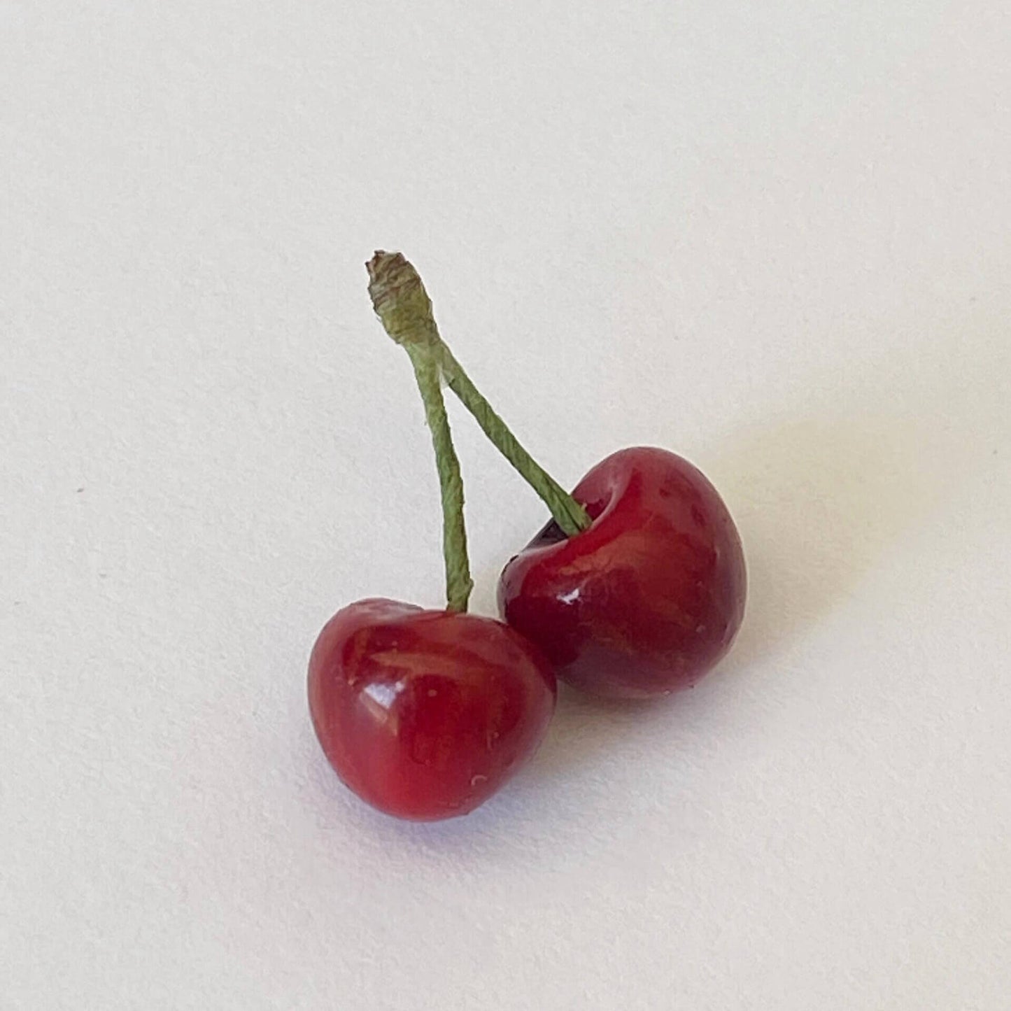 Miniature fruit cherry for a dollhouse. Miniature fruit cherry made of clay. Miniature fruit cherry in 1/6 scale can be used in doll kitchen, doll grocery store, doll food, collection, diorama decoration. Size: 0.5cm / 0.2in