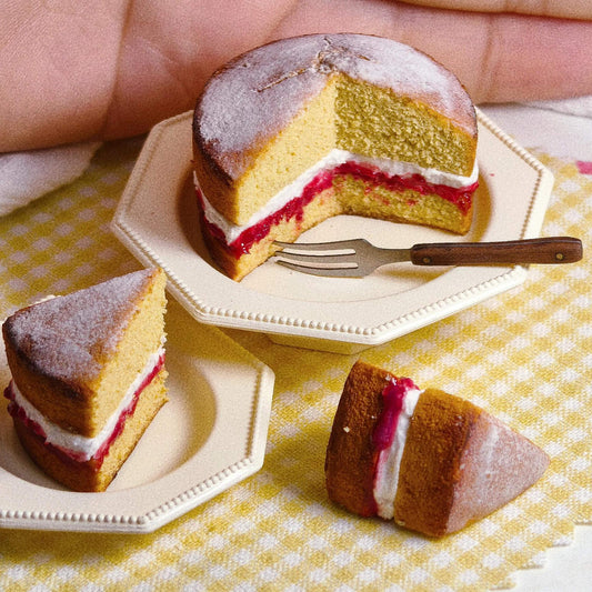 Handmade, each piece is unique! The real thing is super beautiful and cute. Perfect for decorating dollhouses of all sizes! Provided is a highly detailed victoria sponge cake and 2 slices of cake.