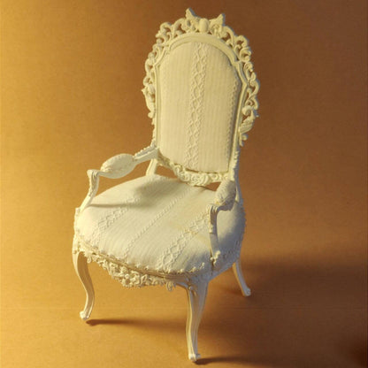 This miniature armchair craft kit is perfect for dollhouse enthusiasts who love combining creativity with fine details. Inspired by shabby chic and vintage European designs, this throne-style chair features intricate carvings and an elegant fabric finish, adding a sophisticated touch to any dollhouse interior. Ideal as a centerpiece for dollhouse living rooms, studies, or bedrooms, this kit brings timeless charm and character to your miniature world. A perfect gift for collectors and craft lovers alike!