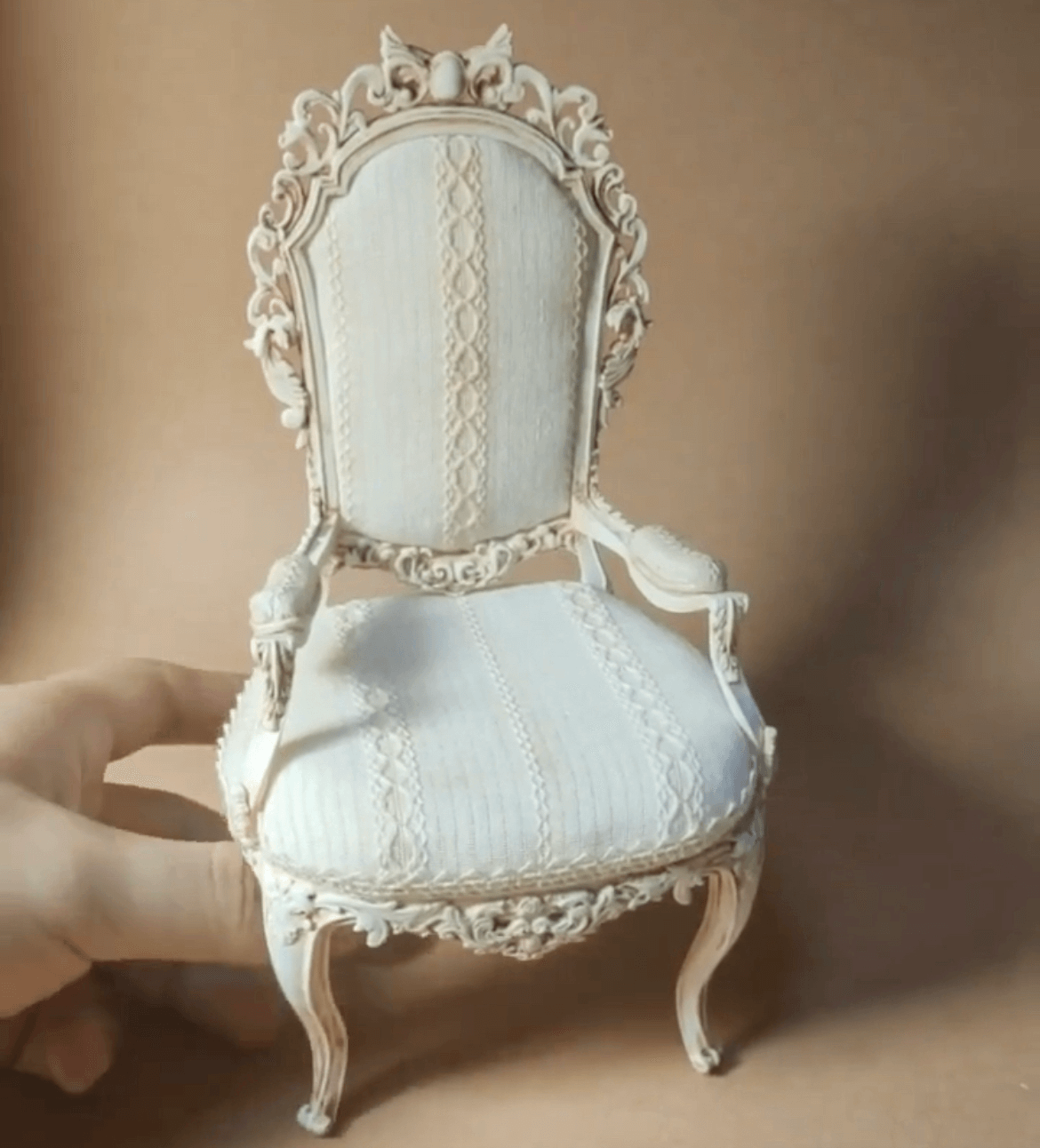 This miniature armchair craft kit is perfect for dollhouse enthusiasts who love combining creativity with fine details. Inspired by shabby chic and vintage European designs, this throne-style chair features intricate carvings and an elegant fabric finish, adding a sophisticated touch to any dollhouse interior. Ideal as a centerpiece for dollhouse living rooms, studies, or bedrooms, this kit brings timeless charm and character to your miniature world. A perfect gift for collectors and craft lovers alike!