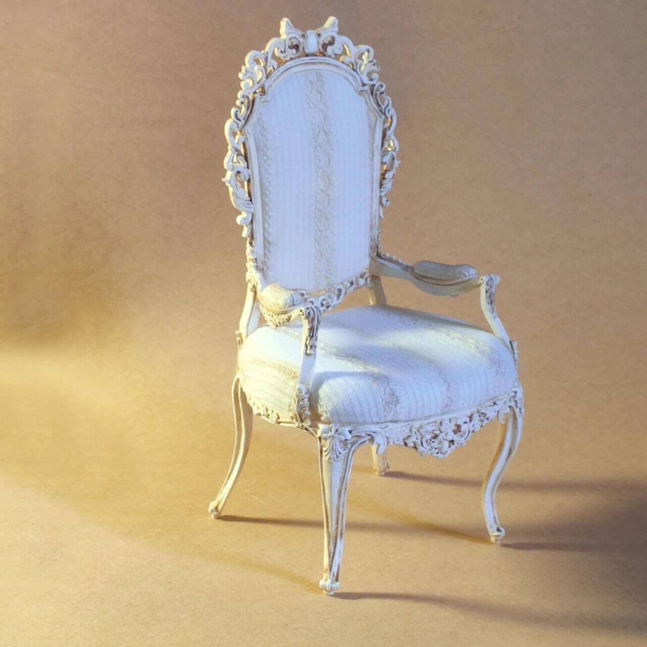 This miniature armchair craft kit is perfect for dollhouse enthusiasts who love combining creativity with fine details. Inspired by shabby chic and vintage European designs, this throne-style chair features intricate carvings and an elegant fabric finish, adding a sophisticated touch to any dollhouse interior. Ideal as a centerpiece for dollhouse living rooms, studies, or bedrooms, this kit brings timeless charm and character to your miniature world. A perfect gift for collectors and craft lovers alike!