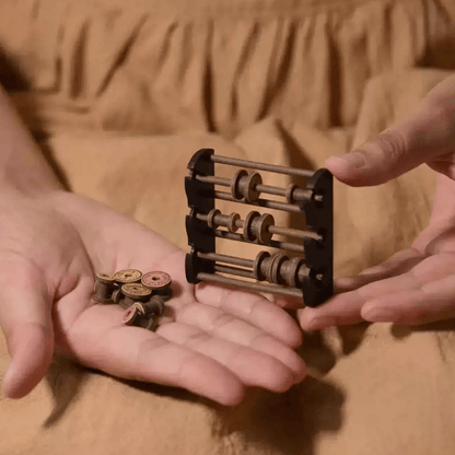 It can easily hold various-sized dollhouse spools of thread for quilting, sewing, or embroidery. Its simple design allows it to look nice in a dollhouse craft room, shop, family room, or bedroom. Default Color/ Finish: Black and Brown Material: Wood Scale: 1/6 (5.5×1.8×5.2cm / 2.17×0.71×2.05in)