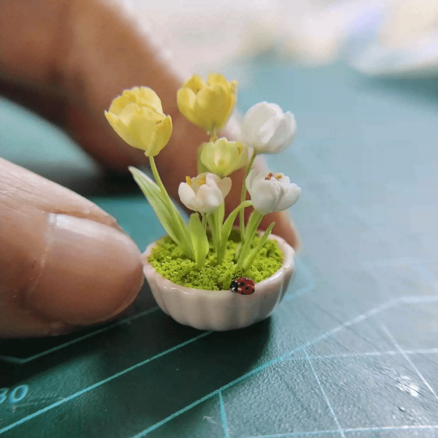 Tulips are erect flowers with long, broad, parallel-veined leaves and a cup-shaped, single or double flower at the tip of the stem.  Material: Handmade from Clay