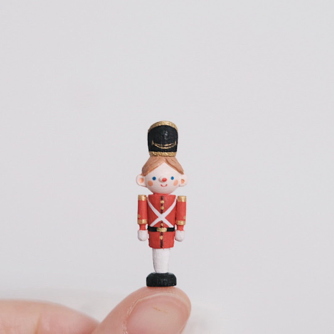 Inspired by "The Steadfast Tin Soldier" The toys are made entirely by hand, and it is normal for them to show signs of handmade craftsmanship. We hope that each toy can receive love and appreciation from its owner. Materials: Wood, Clay.