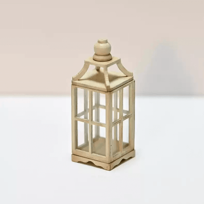 This Miniature Windproof Lantern Candle Holder Kit for Dollhouses is a beautifully designed craft kit perfect for enhancing the charm of any dollhouse or miniature scene. Featuring a realistic windproof design and a detachable top, this lantern adds a cozy, vintage ambiance to dollhouse interiors, patios, or garden settings. Whether you're a crafter, collector, or dollhouse enthusiast, this lantern is a delightful addition that brings warmth and character to your miniature world.