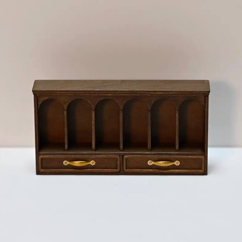 This multifunctional integrated design includes a storage area, pen holders, calculator stapler storage, paper clip holders, a drawer, a note holder, and a document note holder, providing ample space for organizing dollhouse daily office supplies. Default Color/ Finish: Brown Style: Shabby Chic Material: Wood