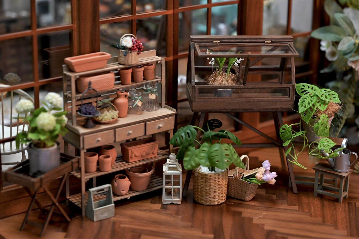 Bring a charming, rustic touch to your dollhouse garden with this Miniature Wooden Greenhouse with Two Doors Kit. This beautifully crafted greenhouse features an openable door design and detailed wooden construction, perfect for displaying miniature plants, flowers, or garden tools. The kit allows you to assemble a functional and decorative piece, adding both style and practicality to your miniature outdoor space.